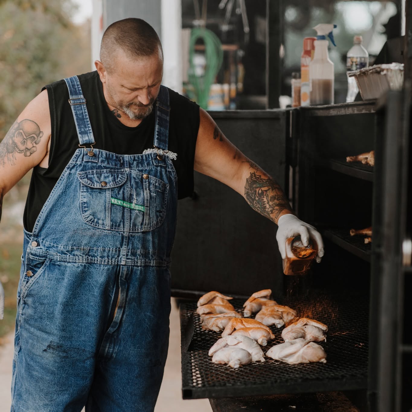 Bernie Thomas of Chasin Tailz BBQ working at the smoker